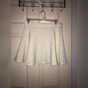 Cream mini flare skirt